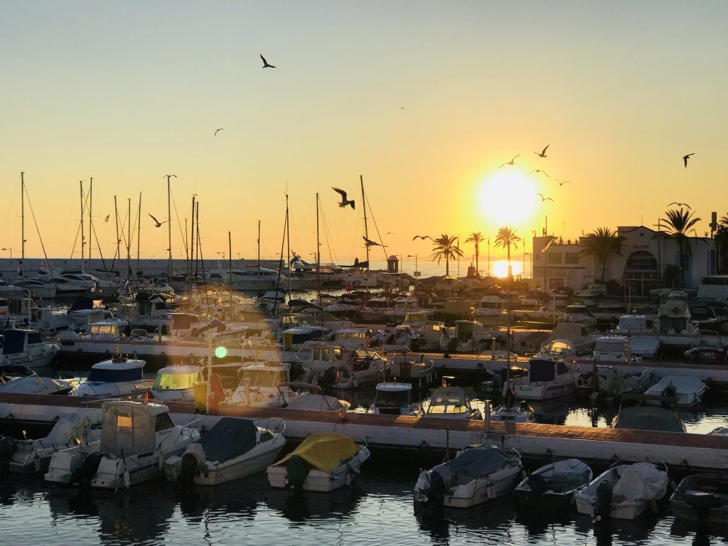 Marbella harbour, view at sunset